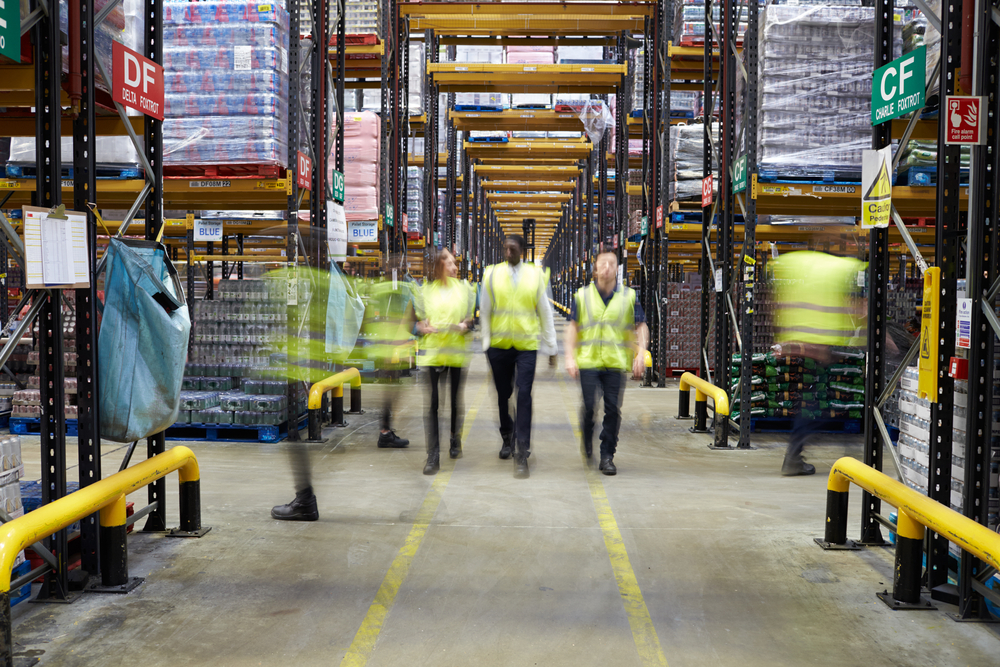 Staff In Reflective Vests Walking